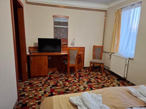 Μια τηλεόραση ή/και κέντρο ψυχαγωγίας στο Atryum Hotel