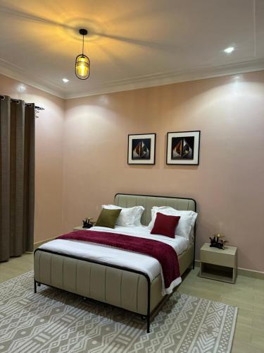 เตียงในห้องที่ Dashluxe 2