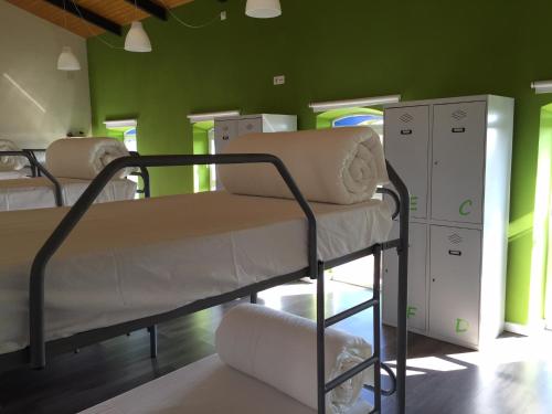 Postel nebo postele na pokoji v ubytování Hostel Cañaveral