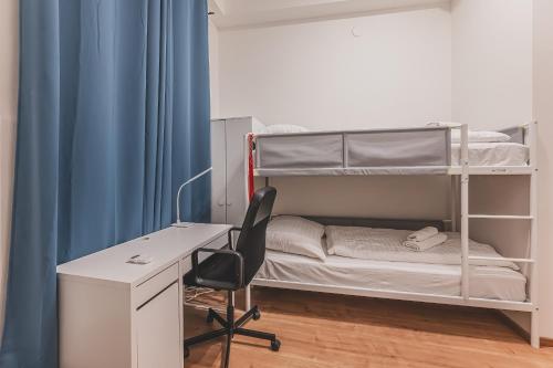 Postel nebo postele na pokoji v ubytování Heart of Prague Retreat 1