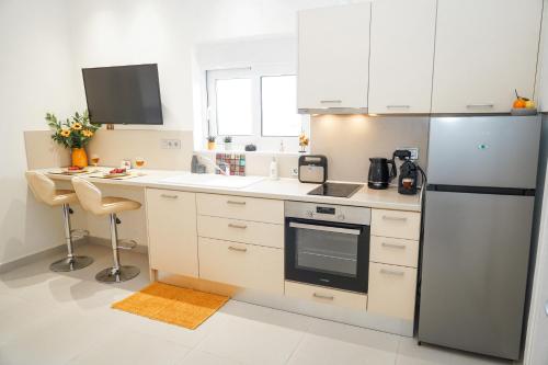 Una cocina o zona de cocina en Kontis Apt 2