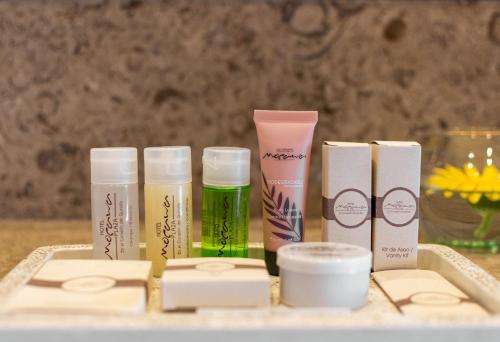 a group of products sitting on a tray at Hotel Mocawa Plaza Armenia in Armenia