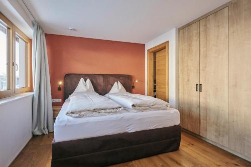Кровать или кровати в номере Fernsicht Alpen-Apartments