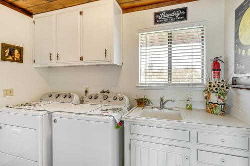 a kitchen with white cabinets and a sink at Pleasant Valley Wine Trail Home - Near Paso Robles in San Miguel