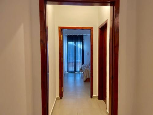an empty hallway with a hallway leading to a room at Nile Panorama Hotel in Luxor