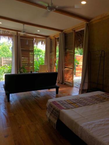 Postel nebo postele na pokoji v ubytování Casa Bahareque