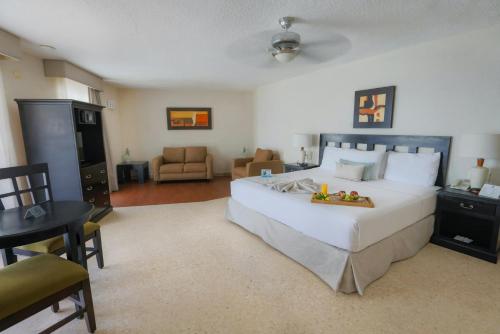 Ein Bett oder Betten in einem Zimmer der Unterkunft Best Western Hotel Posada Freeman Zona Dorada