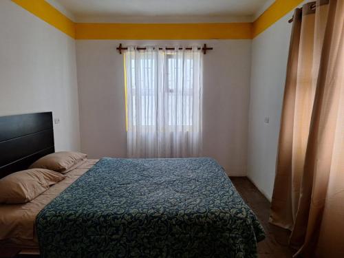 Postel nebo postele na pokoji v ubytování Hostel rivendell lima