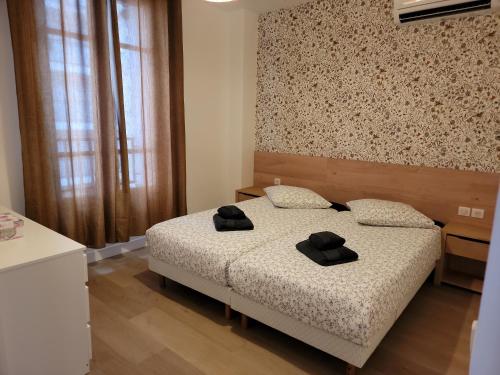 Ένα ή περισσότερα κρεβάτια σε δωμάτιο στο Villa Junon
