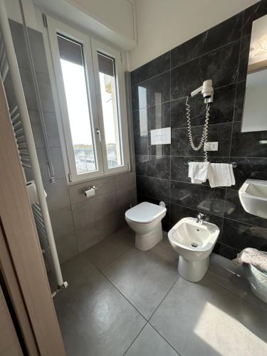 Koupelna v ubytování Hotel Marchina