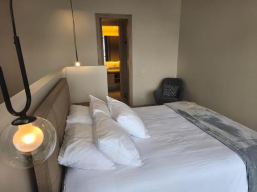 Postel nebo postele na pokoji v ubytování New Coliving Ecuador Luxury Residences