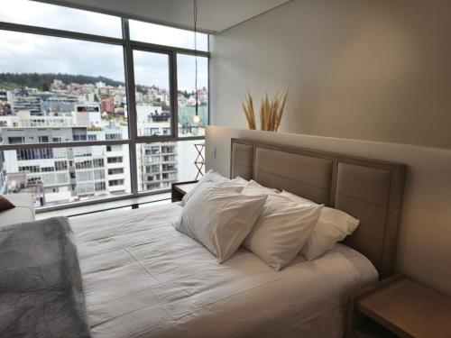 Postel nebo postele na pokoji v ubytování New Coliving Ecuador Luxury Residences