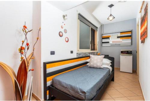 Ένα ή περισσότερα κρεβάτια σε δωμάτιο στο CASA Morgan Holidays in Sicily