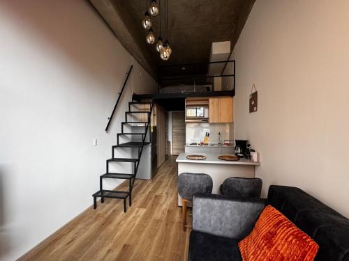 Kuchyň nebo kuchyňský kout v ubytování Rest in a cosy apartment