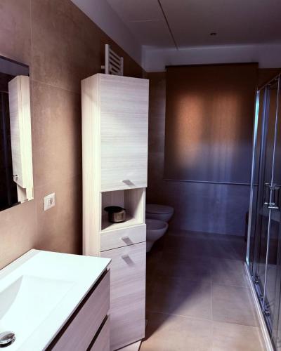a bathroom with a toilet and a sink and a shower at Relais San Giovanni srls in Castellaneta