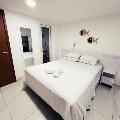 En eller flere senge i et værelse på Paradise Flat 107