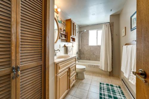 a bathroom with a sink and a toilet and a tub at Tranquil Ranch Home on 10 Acres in Leavenworth! in Leavenworth