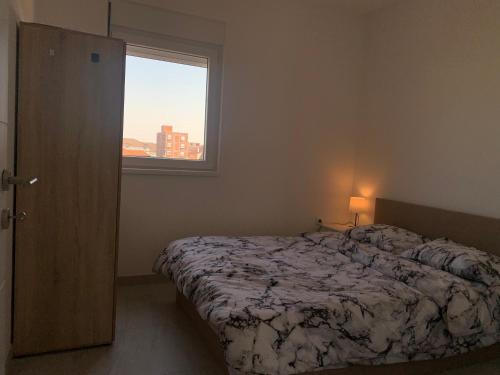 Un ou plusieurs lits dans un hébergement de l'établissement airport Belgrade 2bedrooms