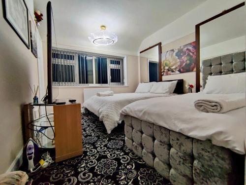 Ein Bett oder Betten in einem Zimmer der Unterkunft Clayton Home