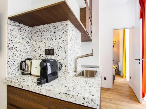 Photo de la galerie de l'établissement Authentic apartment in Paris, à Paris