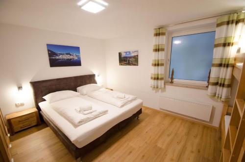 Letto o letti in una camera di Appartement THE GOOD VIEW by All in One Apartments