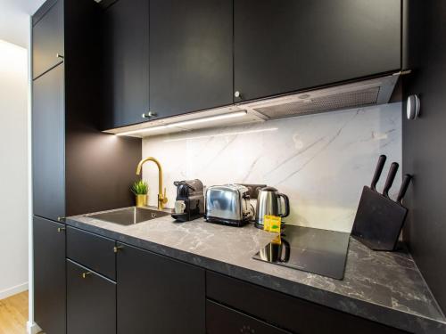 Photo de la galerie de l'établissement Cosy apartment - 2BR 6P - Canal St Martin, à Paris