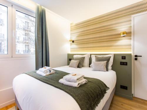 Photo de la galerie de l'établissement Cosy apartment - 2BR 6P - Canal St Martin, à Paris