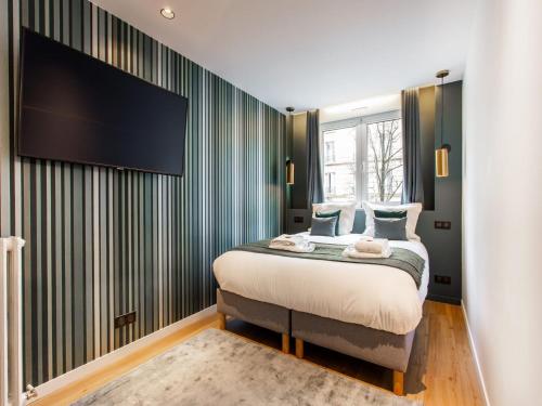 Photo de la galerie de l'établissement Cosy apartment - 2BR 6P - Canal St Martin, à Paris