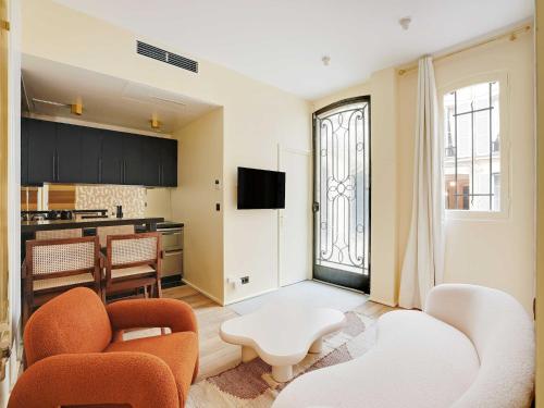 Photo de la galerie de l'établissement Exquisite apartment - Madeleine St Honoré, à Paris