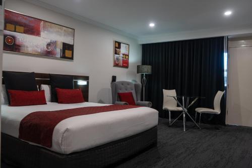 Katil atau katil-katil dalam bilik di Golden West Motor Inn