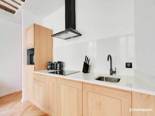 Photo de la galerie de l'établissement Magnificent apartment in Le Marais, à Paris