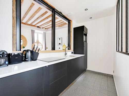 Photo de la galerie de l'établissement Spacious apartment - 2BR 6P - Le Marais, à Paris