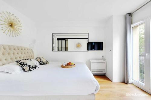 Photo de la galerie de l'établissement Welcoming apartment - 1BR 4P - SacrÃ©-Coeur, à Paris