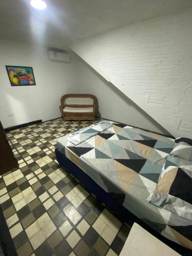 Postel nebo postele na pokoji v ubytování Hostal Familiar