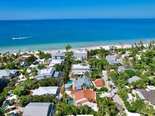 an aerial view of a resort with the beach at Casa Captiva - Deluxe 5 Bedroom Villa Steps to Beach in Captiva