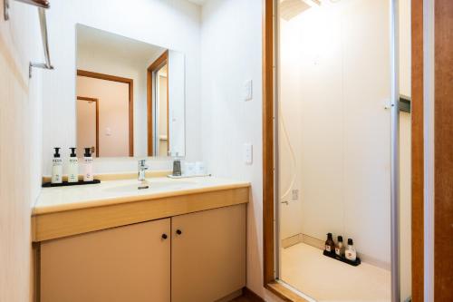 Ein Badezimmer in der Unterkunft Beppu Kannawa Onsen Oniyama Hotel