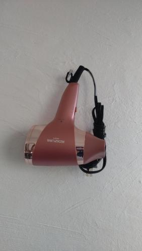 a red light attached to a wall at こにべ一軒家プライベートロッジ in Miyazaki