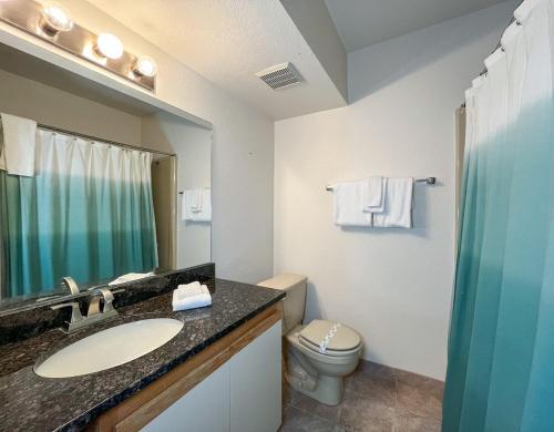a bathroom with a sink and a toilet at 7 Guests 2BR 2BA Pool Hot Tub & Game Room at CBL in Brian Head