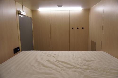 Cama o camas de una habitación en NapzBox