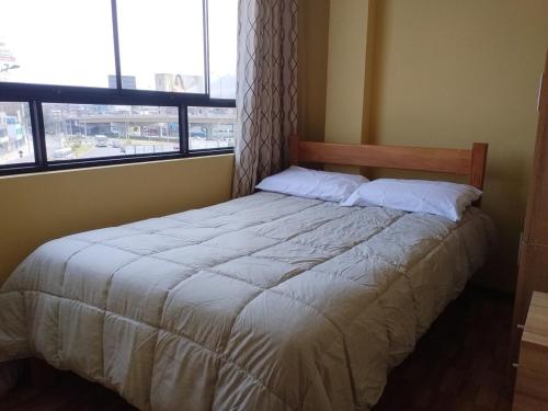 Ένα ή περισσότερα κρεβάτια σε δωμάτιο στο Habich Apartment