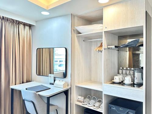 Kuchyň nebo kuchyňský kout v ubytování Grand Earl Hotel