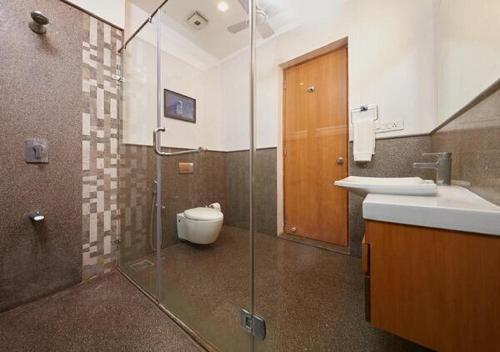 Koupelna v ubytování Maroma Suites ECR