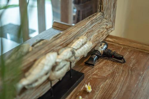 a close up of a gun with a bunch of food at Abhirama Villas and Spa in Ubud