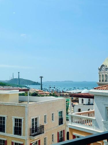 a view of the city from the roof of a building at Luxury Sunset Town Hotel Phu Quoc in Phu Quoc