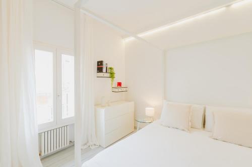 Postel nebo postele na pokoji v ubytování Forte 51 white