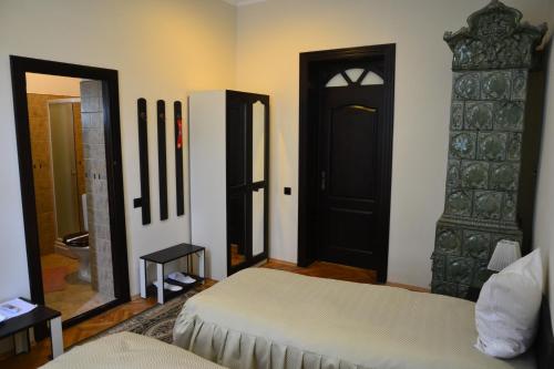 Tempat tidur dalam kamar di Porto Franco Residence