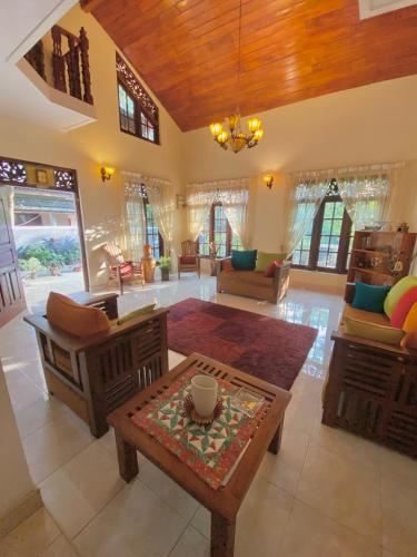 Χώρος καθιστικού στο Dili's Home Stay