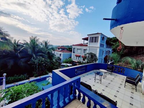 a view from the balcony of a house at 4BHK Hilltop Villa with Private Pool Near Candolim in Nerul
