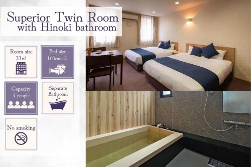 a hotel room with two beds and a bath tub at Hotel Teiregikan in Tobe