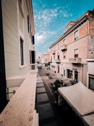 a view of an empty street with buildings at Casa della Lavanda Apartment in Oristano